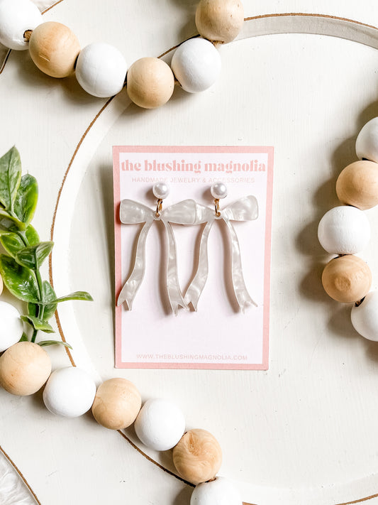 White Pearl Bow Dangle Earrings