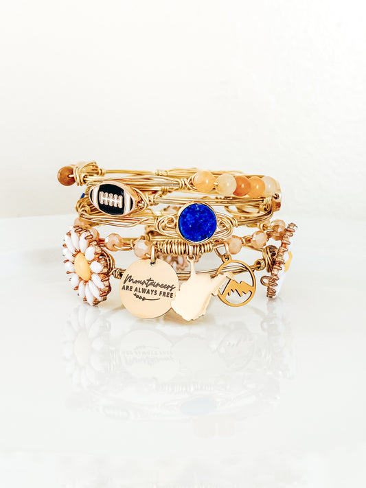 Mountaineers Are Always Free Charm Set